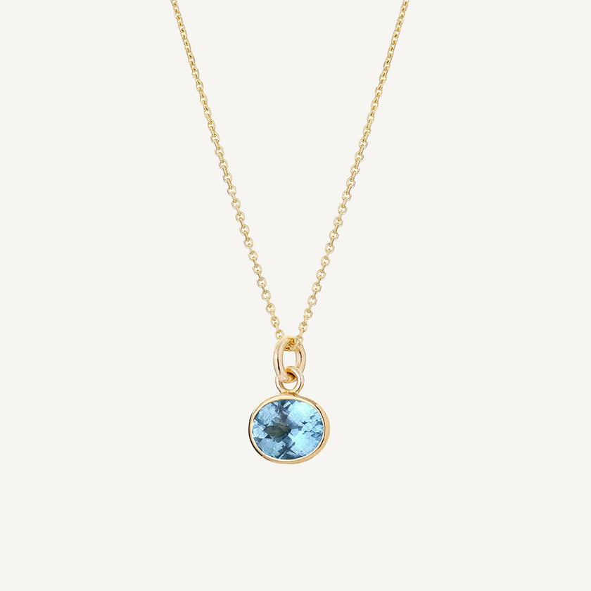 9 Carat Gold Fine Trace Chain & Blue Topaz Sweetie
